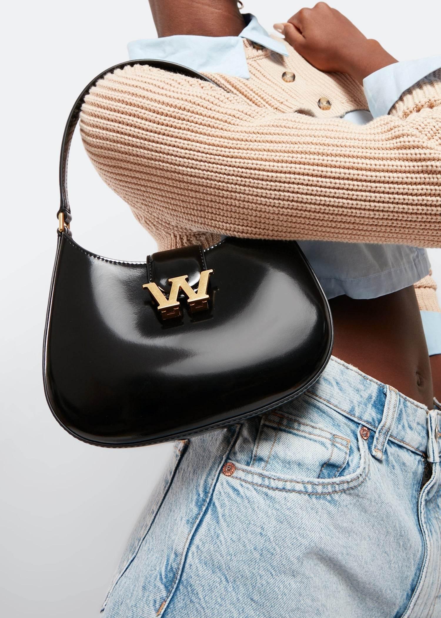 wearing Alexander Wang Gold W Legacy Black Small Hobo Bag 20322R31L001