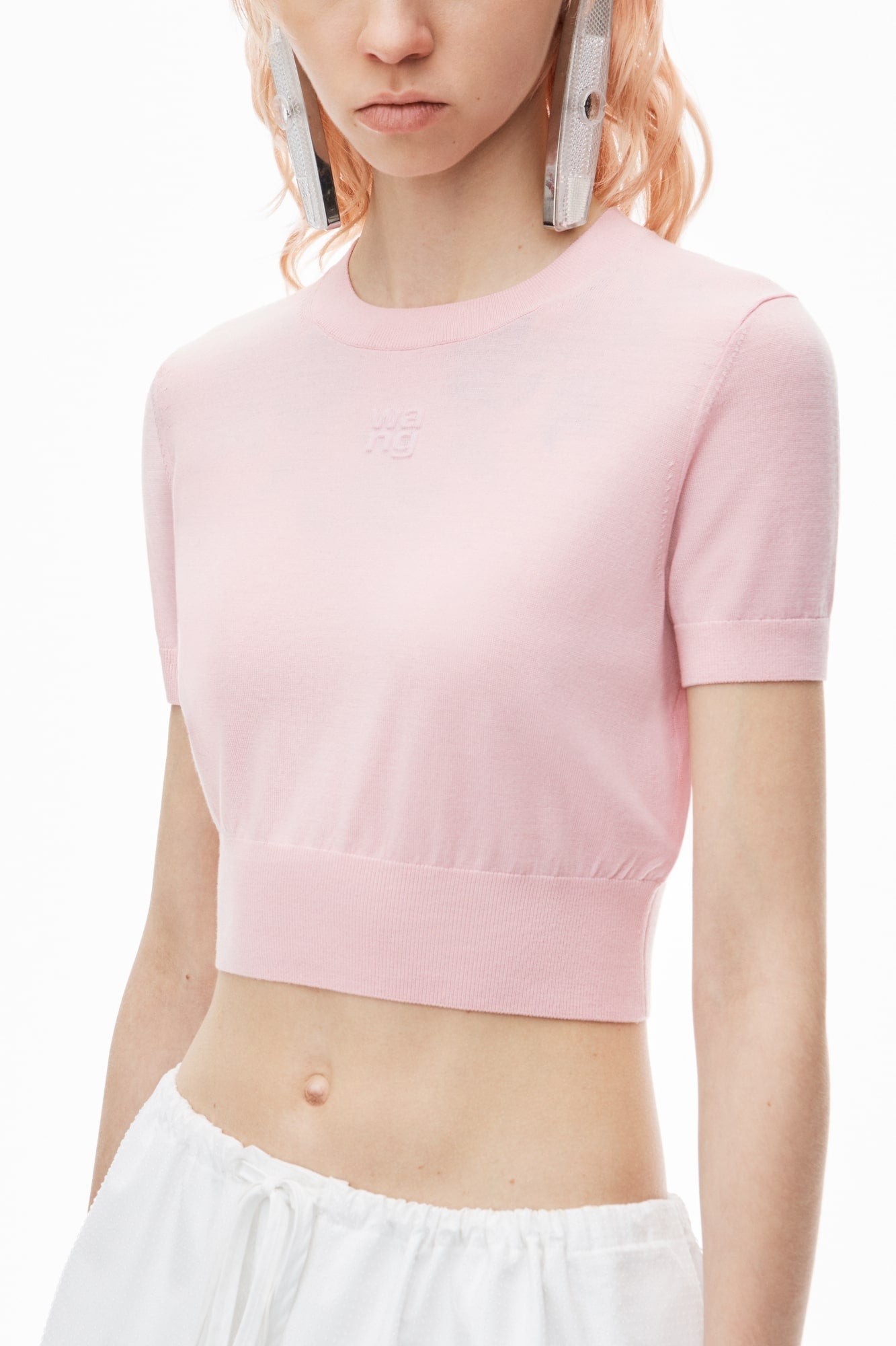 nữ mặc áo Alexander Wang Logo-Embossed Pink Superfine Merino Wool Tee 4KC3241037690B
