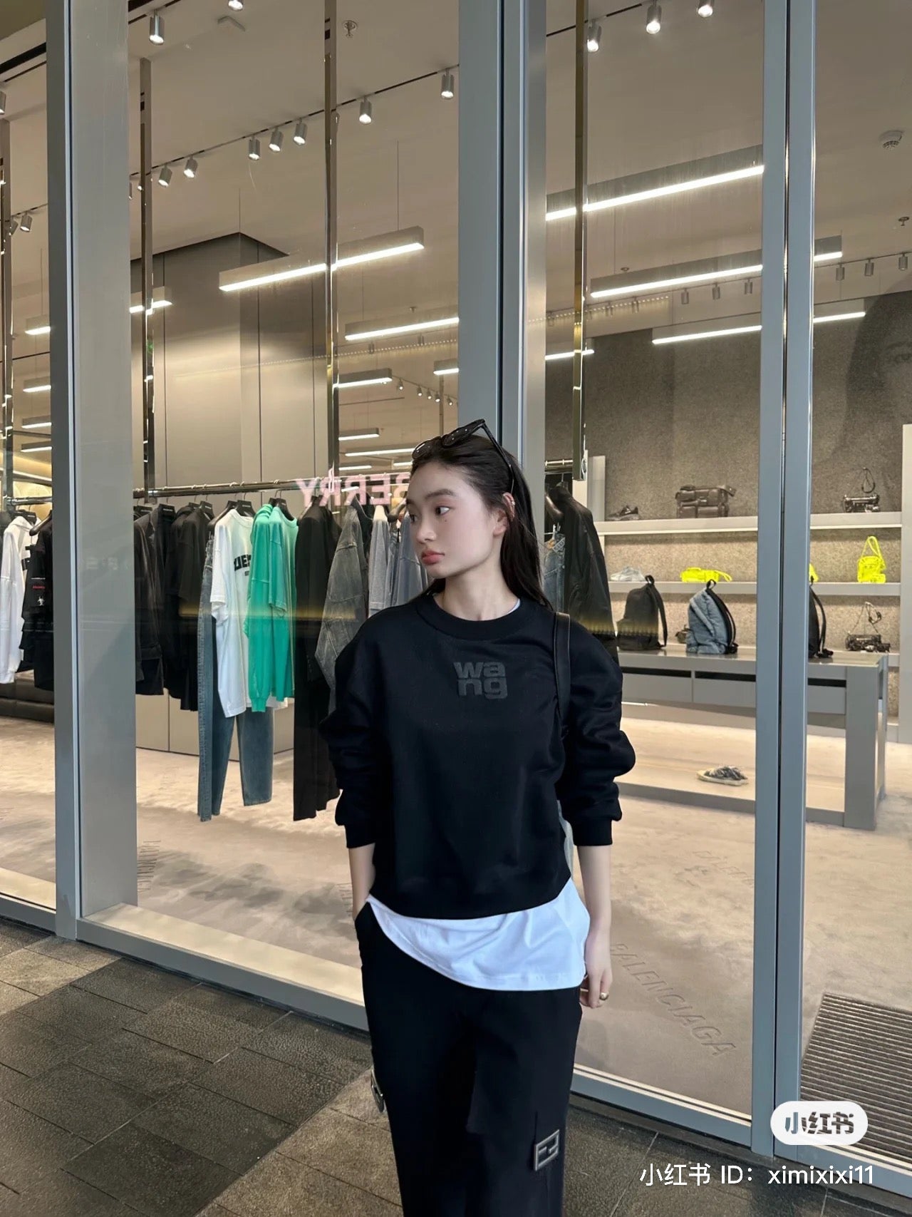 wearing ALEXANDER WANG PUFF LOGO SWEATSHIRT IN STRUCTURED TERRY BLACK 4CC3221360001