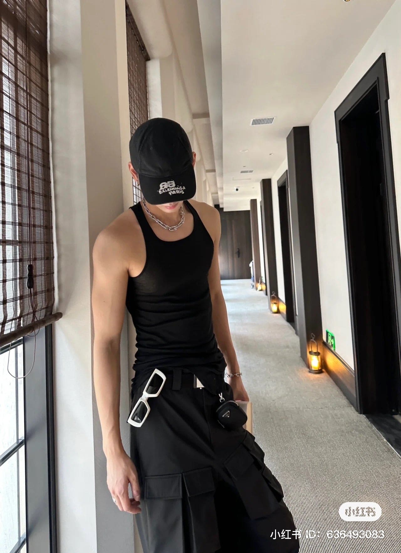 wearing nón BALENCIAGA HAND-DRAWN BB ICON CAP IN BLACK 723771410B21077
