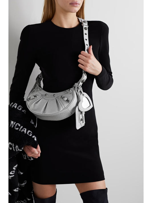 wearing Balenciaga Le Cagole XS Shoulder Bag Glitter Silver FW23 671309210O98110