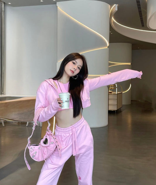 wearing BALENCIAGA LE CAGOLE XS PINK SHOULDER BAG FW23 6713091VG9Y5812