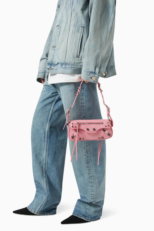 wearing Balenciaga Le Cagole XS Sling Bag Pink 7716701VG9Y5812