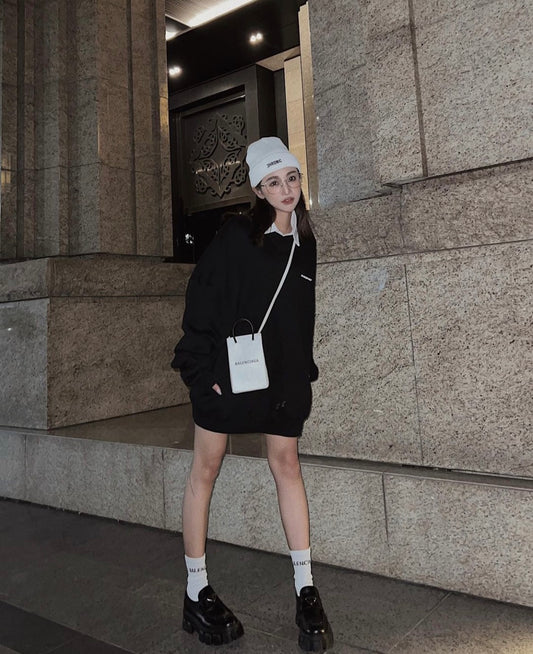 wearing BALENCIAGA MINI SHOPPING BAG IN WHITE 5938260AI2N9000