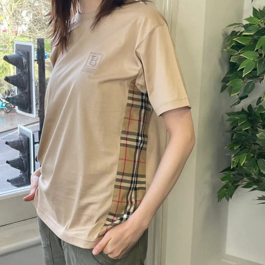 wearing Burberry BBox Carrick Check Waist T-Shirt In Soft Fawn 8067071