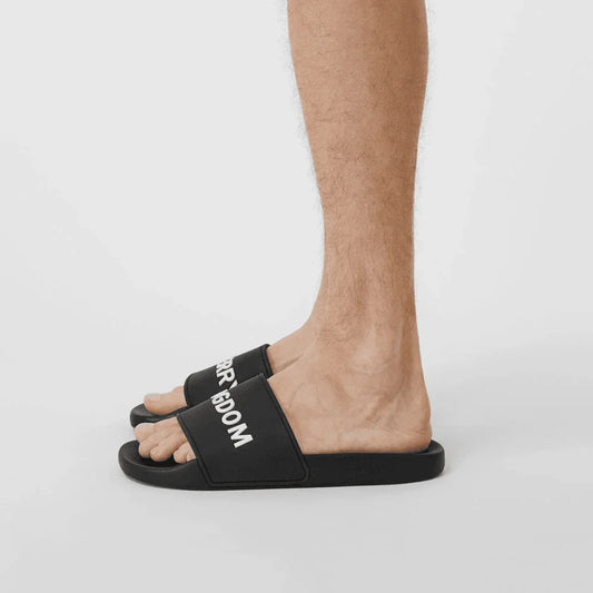 wearing Burberry Black Kingdom Motif Slides 8009769