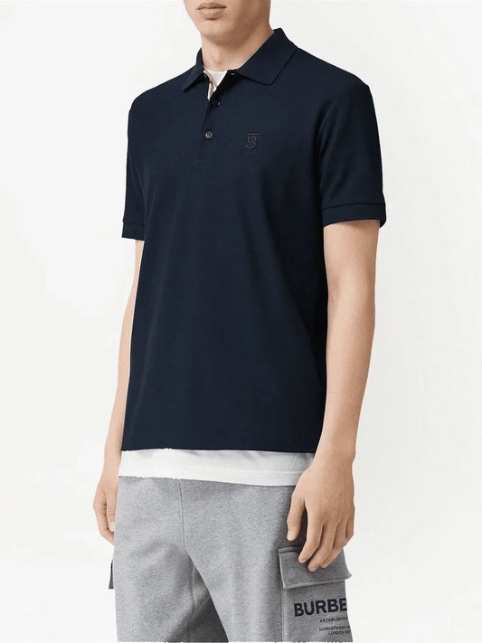 wearing BURBERRY BT LOGO EMBROIDERED POLO SHIRT IN NAVY 8055227