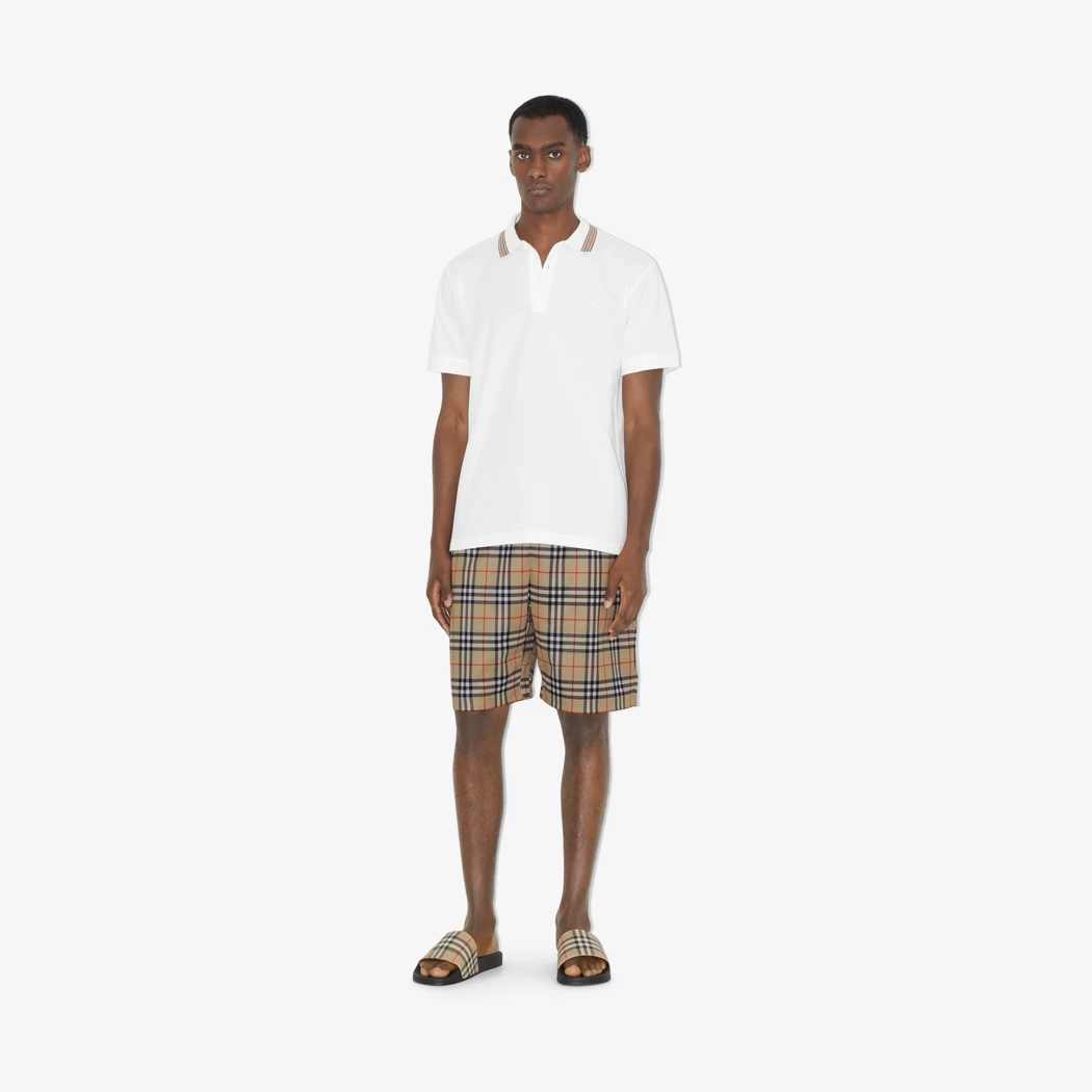 wearing Burberry Checked Slides In Archive Beige 80569421