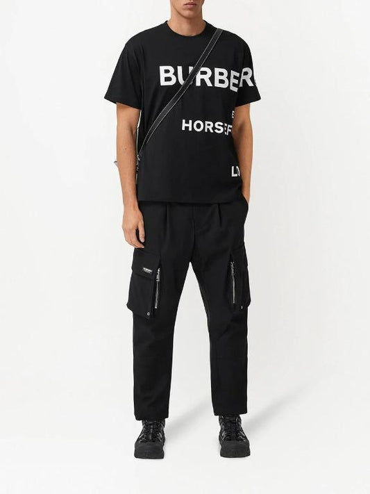 wearing Burberry Horseferry Print Oversized T-Shirt In Black 8040694