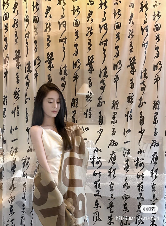 wearing BURBERRY LOGO WOOL JACQUARD SCARF IN BIRCH BROWN 80571481