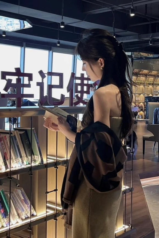 wearing BURBERRY LOGO WOOL JACQUARD SCARF IN DARK BIRCH BROWN/BLACK 80630471