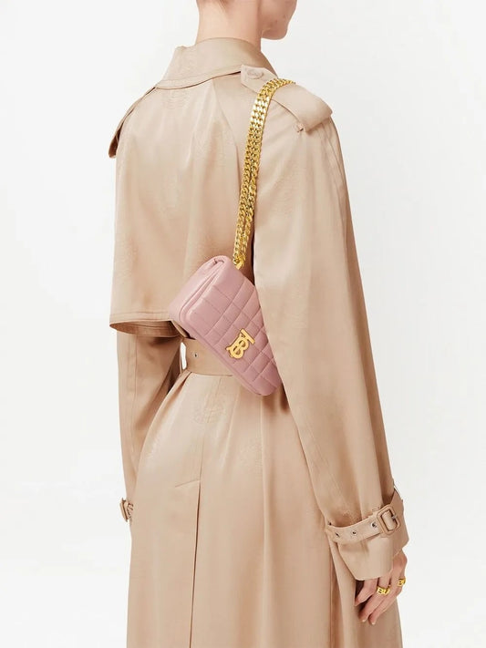 wearing BURBERRY MINI LOLA QUILTED LEATHER BAG IN PINK WITH GOLD HARDWARE 80630141