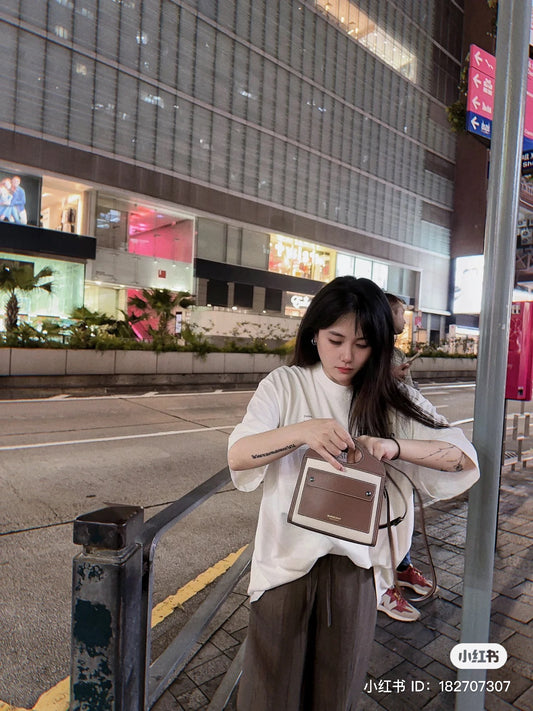 wearing BURBERRY TWO TONE CANVAS LEATHER POCKET MINI SHOULDER BAG 80528981