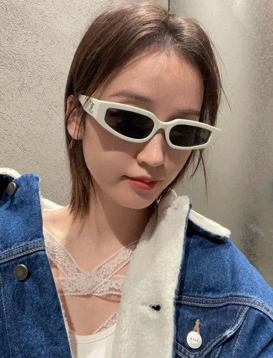wearing CELINE 12 TRIOMPHE ACETATE SUNGLASSES WHITE CL40269U-25A