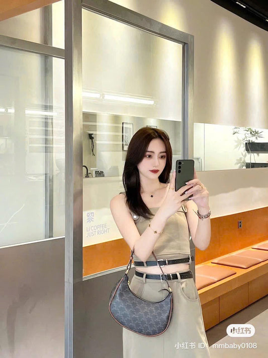 wearing CELINE AVA BAG IN TRIOMPHE CANVAS AND CALFSKIN TAN 193952BZJ.04LU