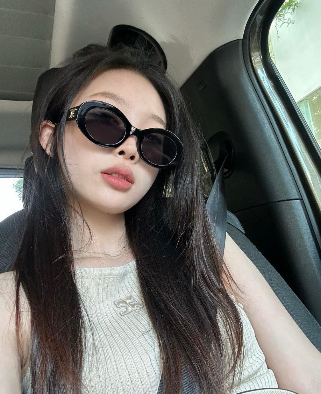 wearing CELINE TRIOMPHE 01 SUNGLASSES IN ACETATE BLACK 4S194CPLB.38NO
