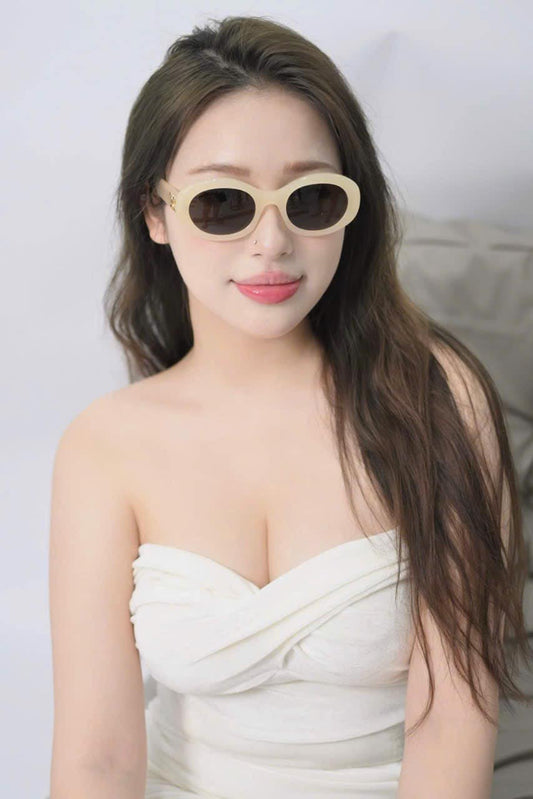 wearing Celine Triomphe 01 Milky Light Orange Sunglasses - CL40194U 44E 4S194CPLB.20ML