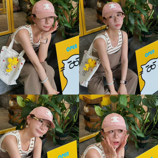 wearing Celine Triomphe Baseball Cap In Washed Cotton Pink 2AUT6234X.02BH
