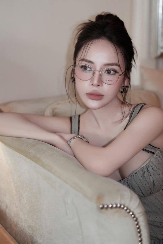 wearing CHANEL CH2209 C124 EYEGLASSES SILVER