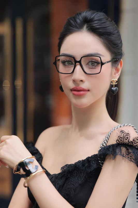 wearing CHANEL CH3448 C622 EYEGLASSESS