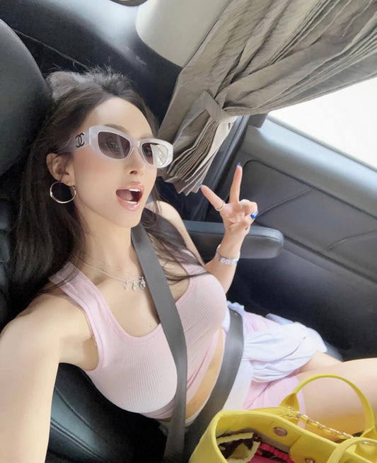 wearing CHANEL CH5493 1730S6 RECTANGULAR LIGHT GREY SUNGLASSES