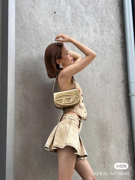 mẫu nữ mang túi kẹp nách DIESEL 1DR GOLD MIRRORED LEATHER BAG X08396PS202 H0500
