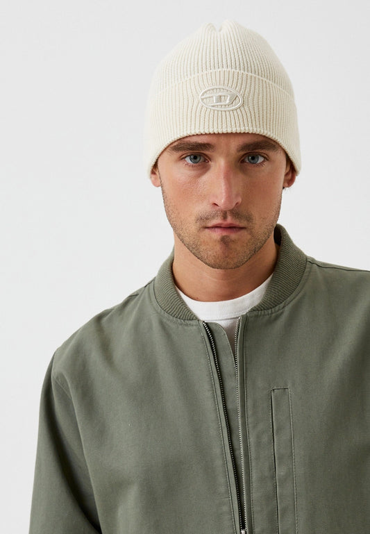 wearing Diesel K-CODER-FULLY B White Beanie A040920DAOB1AB