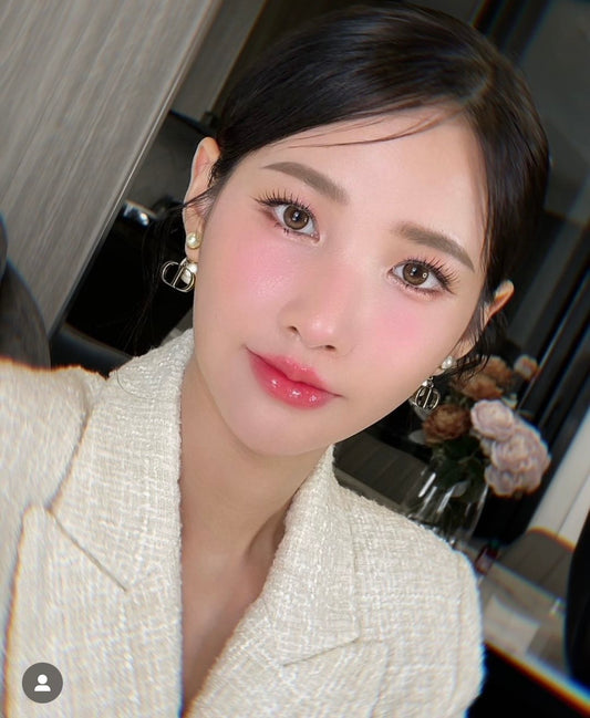 wearing DIOR TRIBALES EARRINGS ANTIQUE GOLD & WHITE E1293TRIRS_D908