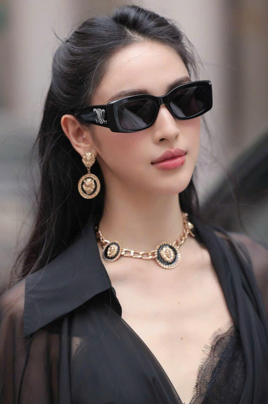wearing CELINE TRIOMPHE XL 01 SUNGLASSESS IN ACETATE BLACK 4S282CPLB.38NO