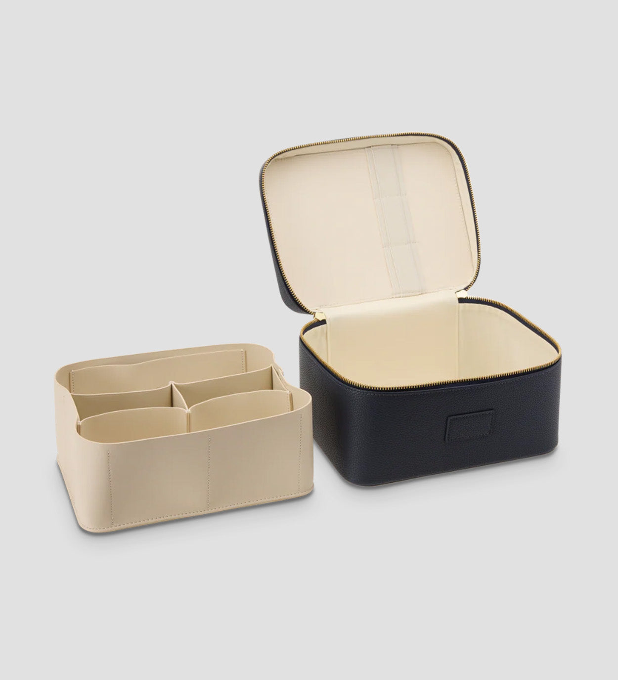 Open Etoile Vanity Case Navy with compartments, on a light gray background.