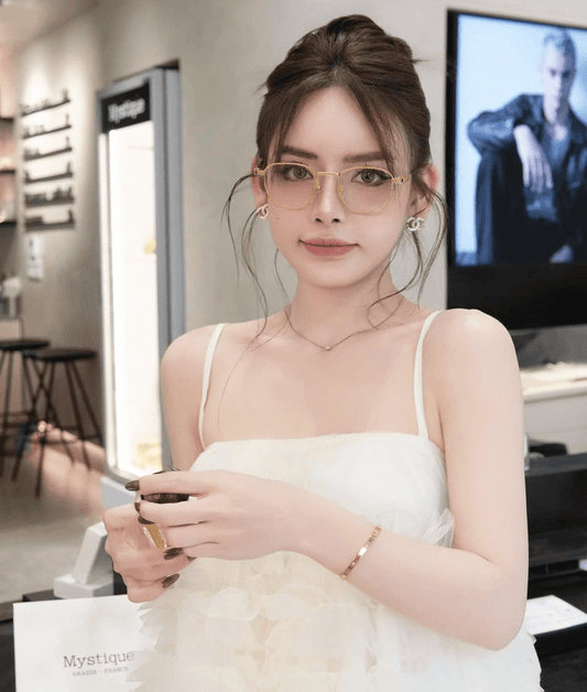 wearing Gucci GG1878O 001 Metal Web Eyeglasses Gold