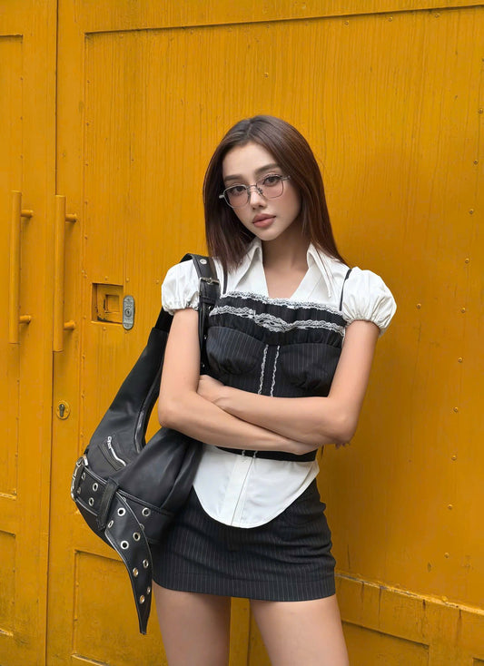Woman wearing Gentle Monster (GM) Catta C1(P) with a black backpack standing against a yellow wall
