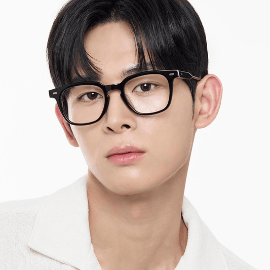 Person wearing Gentle Monster (GM) Kubo 01 with a plain white background