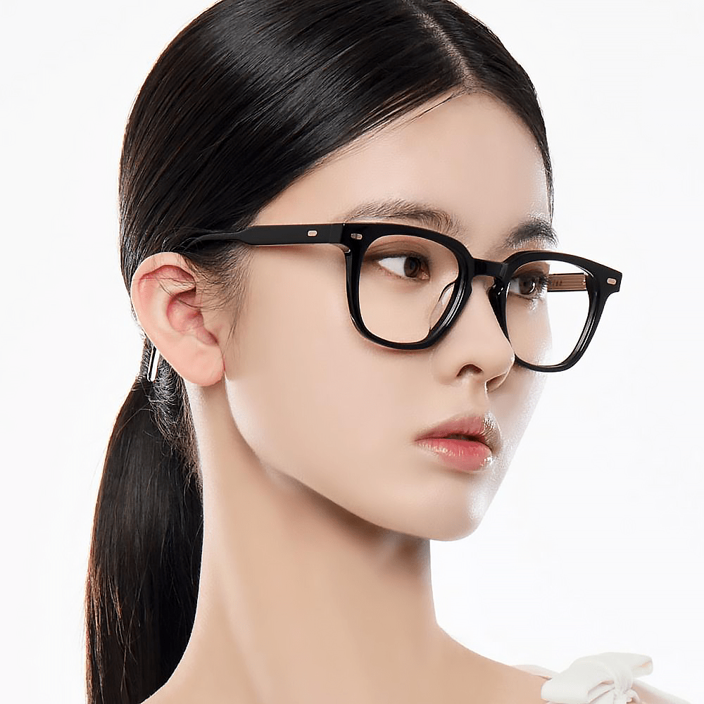 Woman wearing Gentle Monster (GM) Kubo 01 with a plain white background
