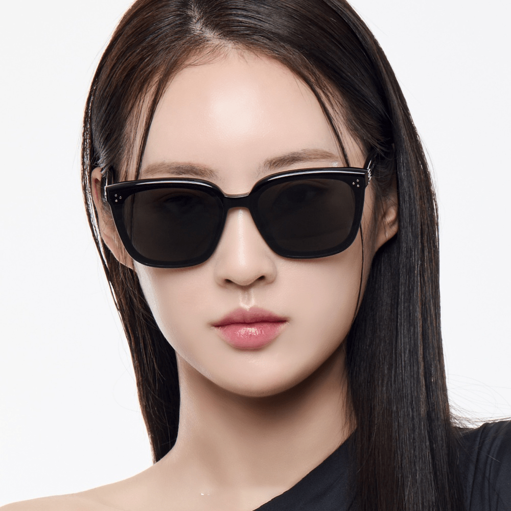 Woman wearing Gentle Monster (GM) My Me 01 against a white background