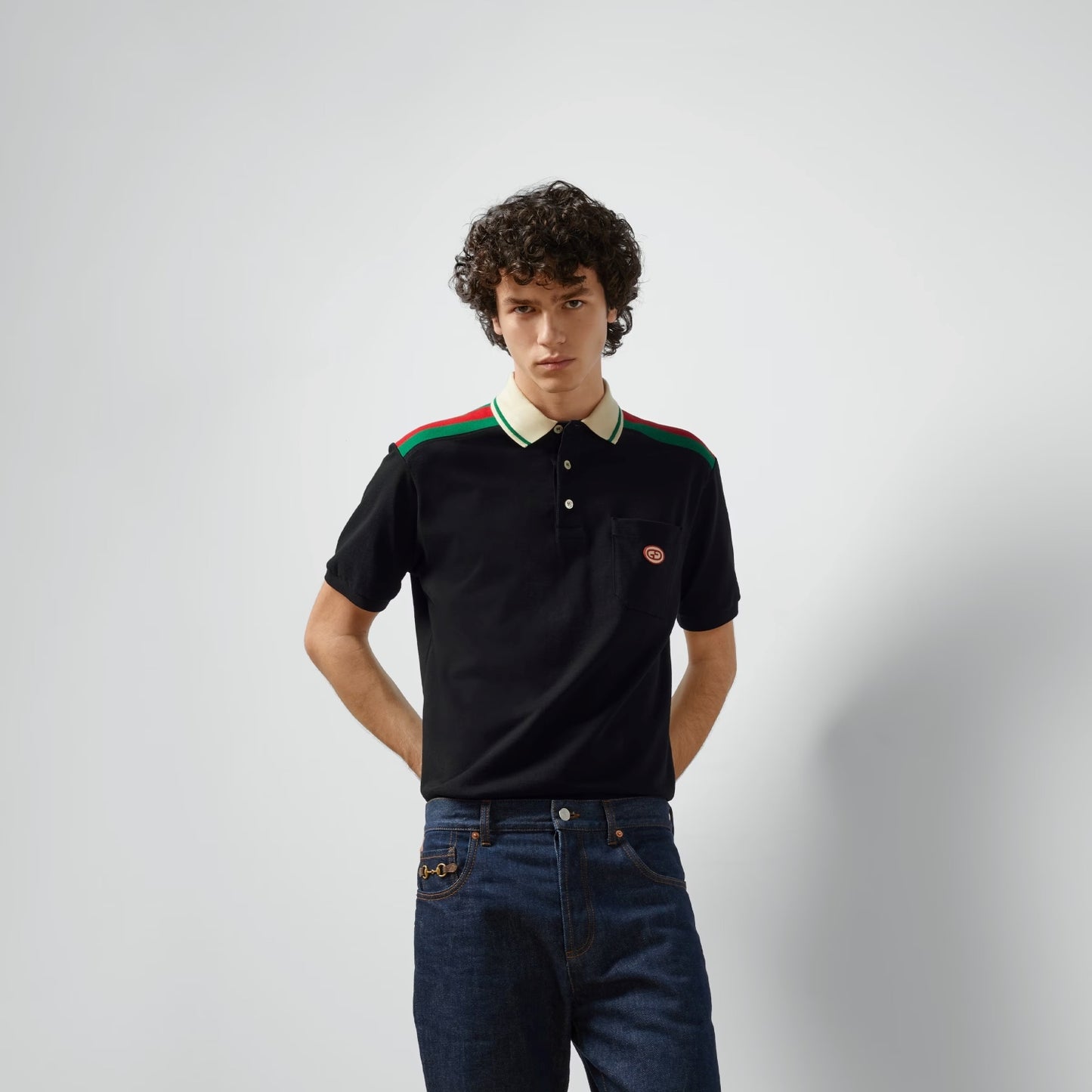 wearing GUCCI BLACK COTTON POLO WITH INTERLOCKING G 737656 XJF4V 1043