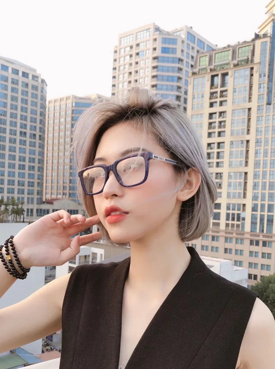 wearing GUCCI GG0560O 005 BLACK GOLD CRYSTAL EYEGLASSES