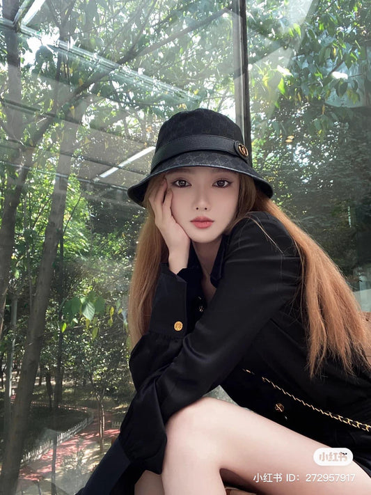 wearing GUCCI GG CANVAS BUCKET HAT WITH DOUBLE G IN BLACK 576587 4HG53 1060