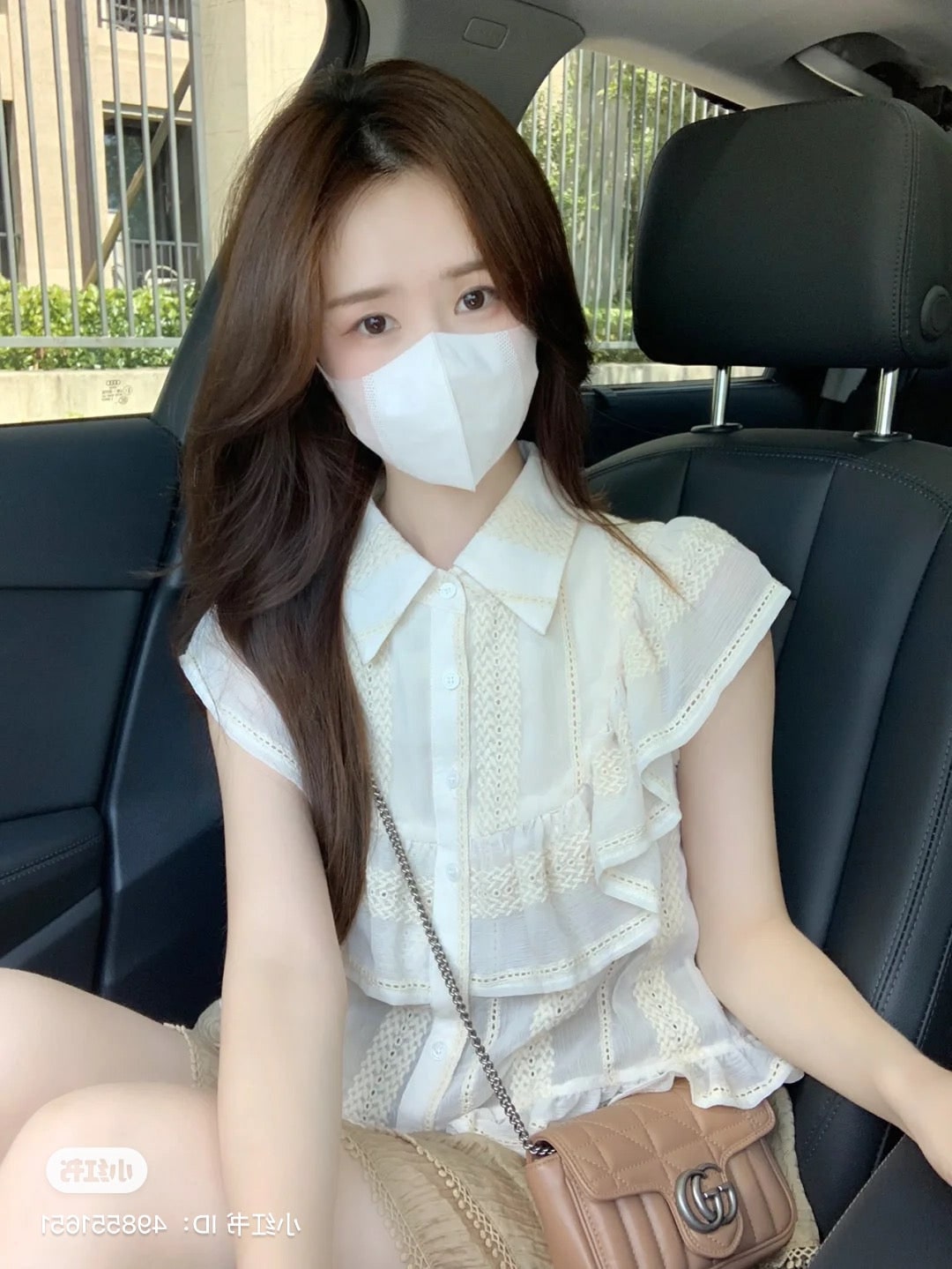 Woman wearing Gucci GG Matelassé Marmont Mini Bag Rose Beige 476433 DTD5N 2754 sitting in a car
