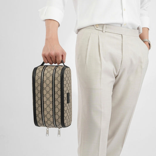 wearing Gucci GG Supreme Toiletry Pouch In Beige and Black 406395 kgdhn 9769