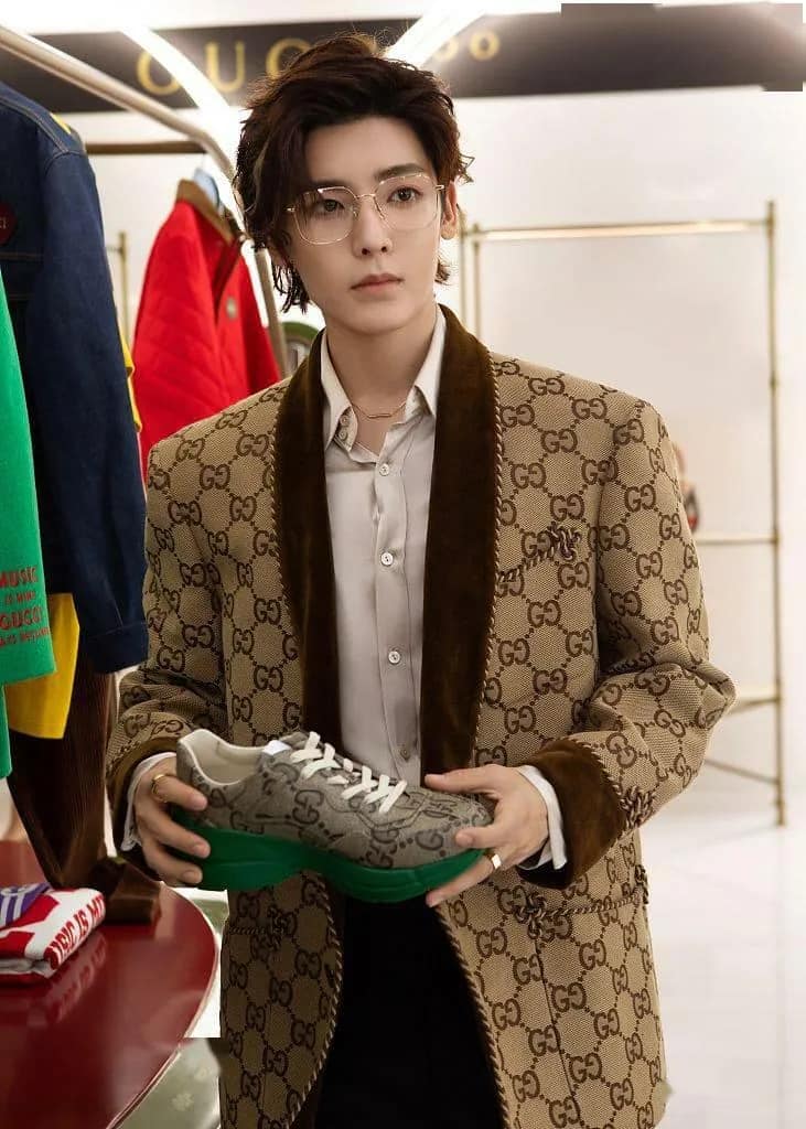 wearing GUCCI GG1032O 005 GOLD EYEGLASSES