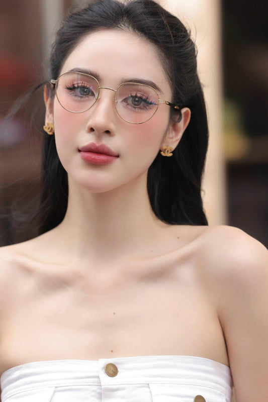 wearing GUCCI GG1458O 001 ROUND GOLD EYEGLASSES