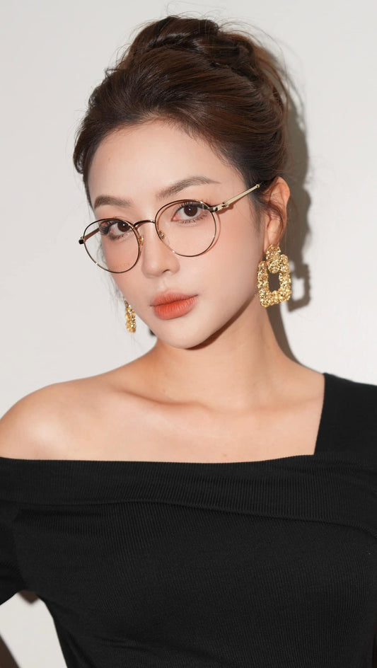 wearing GUCCI GG1472OJ 001 GG ROUND EYEGLASSES