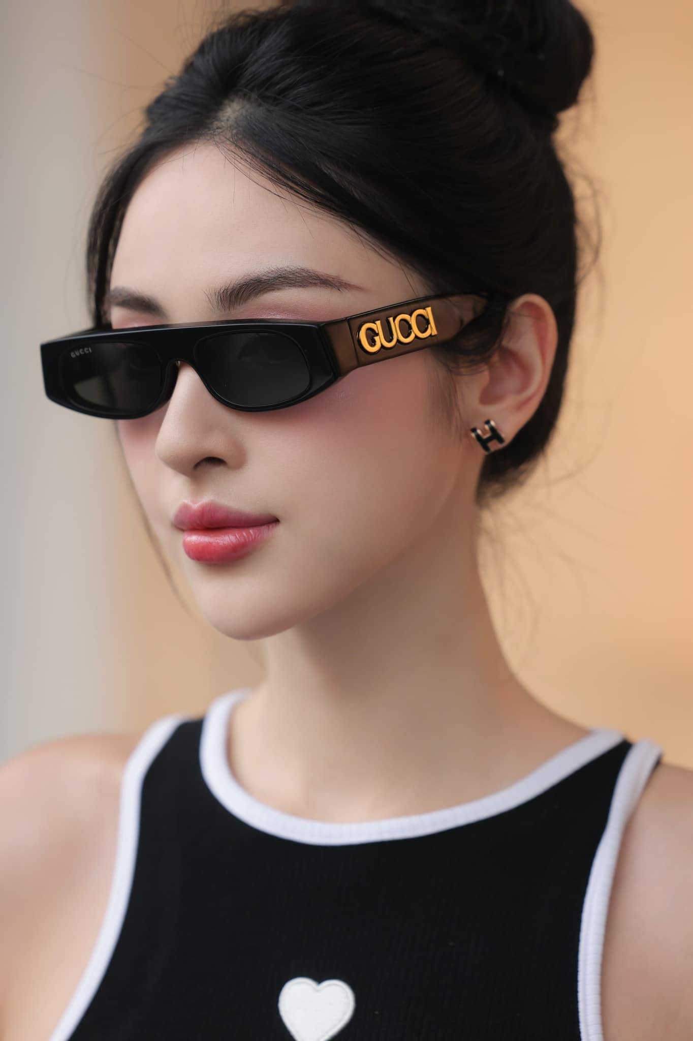 wearing GUCCI GG1771S 001 SUNGLASSES BLACK