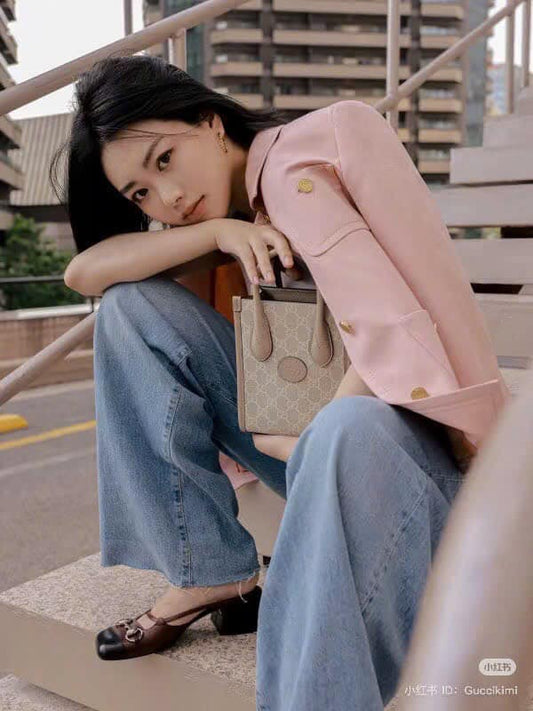 wearing GUCCI MINI TOTE BAG WITH INTERLOCKING G WHITE 671623 UULBT 9683