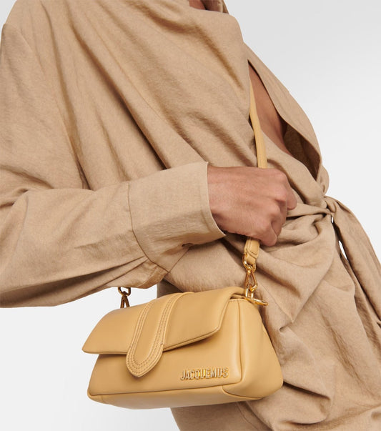 wearing JACQUEMUS LE BAMBIMOU CAMEL 233BA335-3073-830