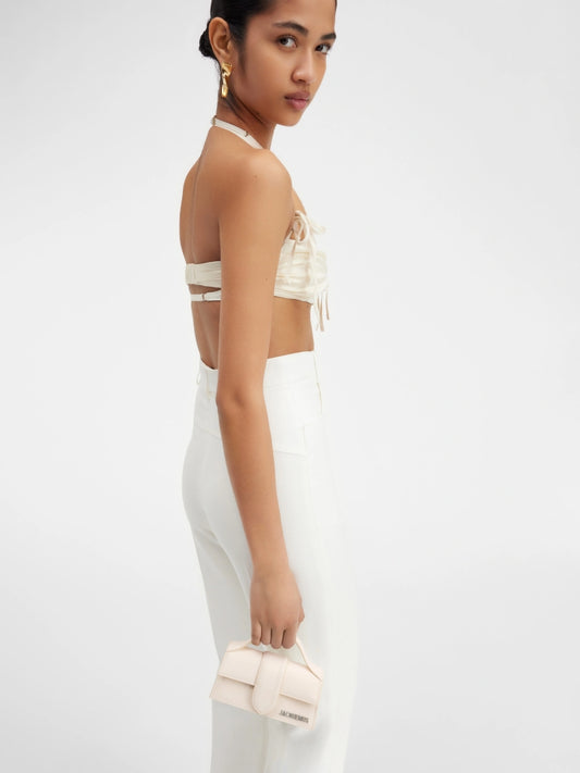 wearing JACQUEMUS LE BAMBINO OFF-WHITE 213BA006-3128-110