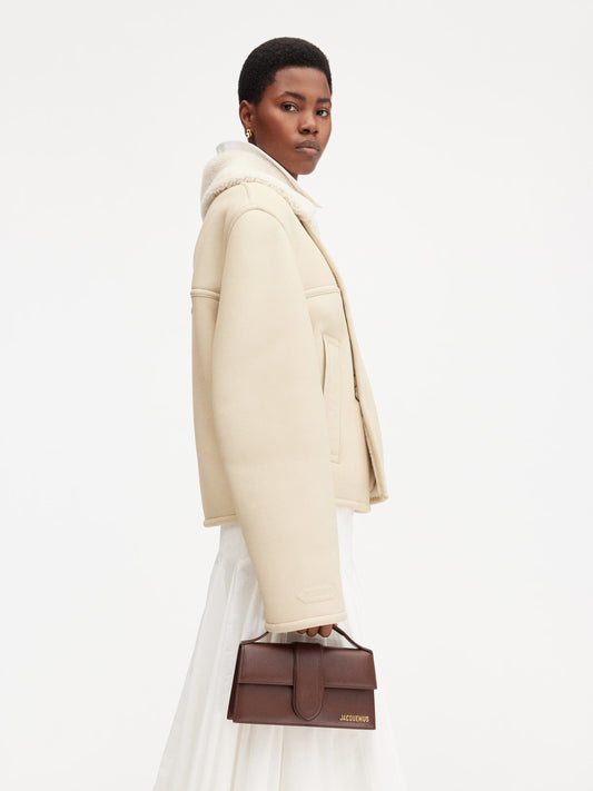 wearing Jacquemus Le Grand Bambino Brown 213BA007-3100-850