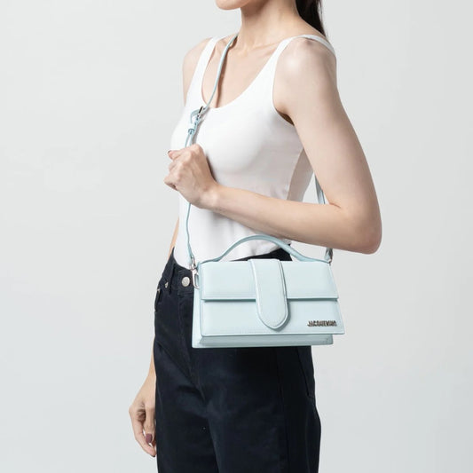 wearing JACQUEMUS LE GRAND BAMBINO LIGHT BLUE 213BA007-3128-320