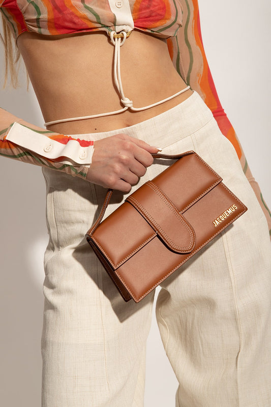 wearing JACQUEMUS LE GRAND BAMBINO LIGHT BROWN 213BA007-3072-811